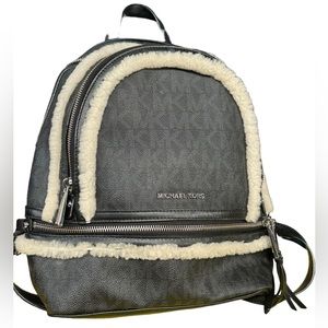 Michael Kors black signature leather rabbit for trim backpack purse bag